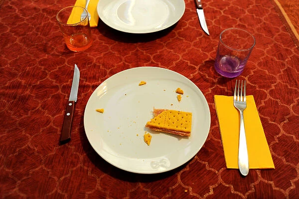 A snack is seen on the table of Carlo Spinazzis kitchen, in his illegally occupied