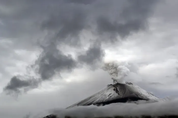 Framed Print : The snow-covered Popocatepetl volcano spews a cloud of steam high into the air in Puebla Framed Print : The snow-covered Popocatepetl volcano spews a cloud of steam high into the air in Puebla