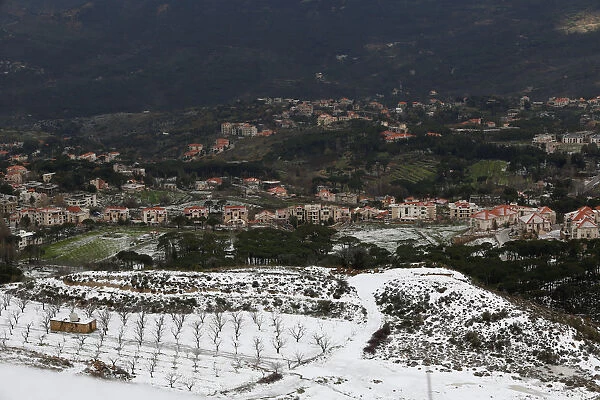 Snow covers fields near Sawfar village
