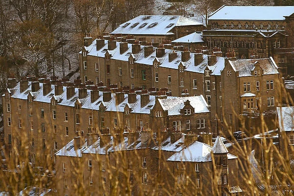SNOW LIES ON THE ROOFS OF HOUSES IN HEBDEN BRIDGE AFTER A HEAVY SNOW FALL OVER NIGHT