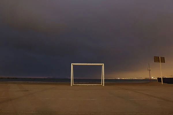 A soccer goalpost stands at Pescadores beach in Chorrillos, Lima