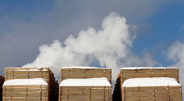Softwood lumber is stacked at Groupe Crete, a sawmill in Chertsey, Quebec
