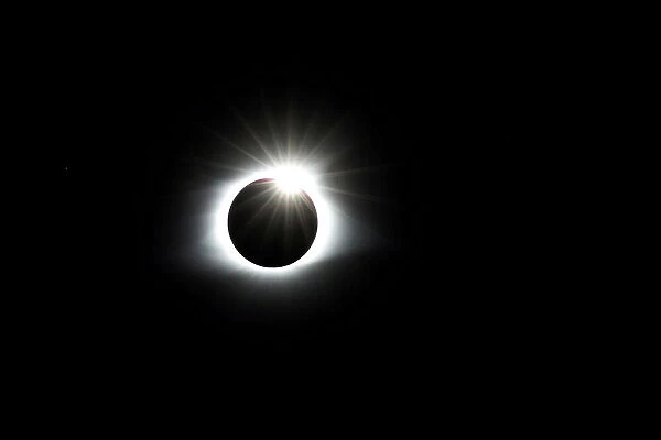 The solar eclipse creates the effect of a diamond ring at totality as seen from Clingmans
