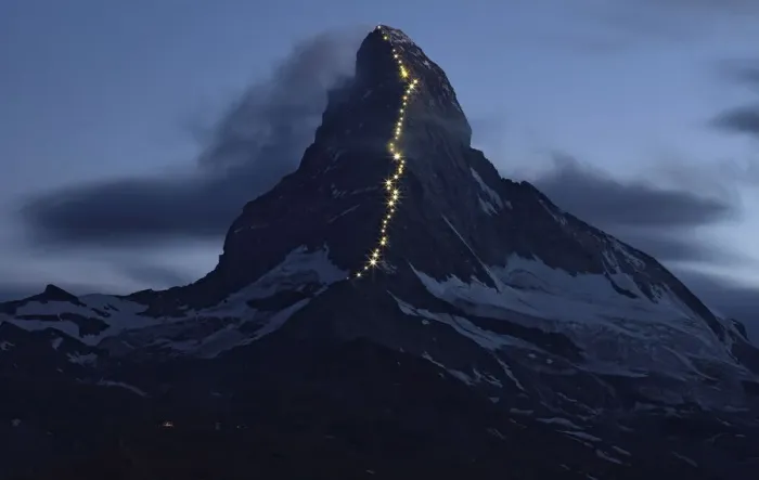 Framed Print : Solar powered lights are pictured along the Hoernli ridge on the Matterhorn in Zermatt Framed Print : Solar powered lights are pictured along the Hoernli ridge on the Matterhorn in Zermatt