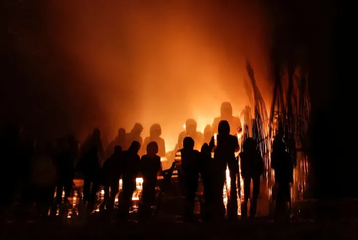 Framed Print : Spectators look at the burning installation during a performance devoted to Maslenitsa in