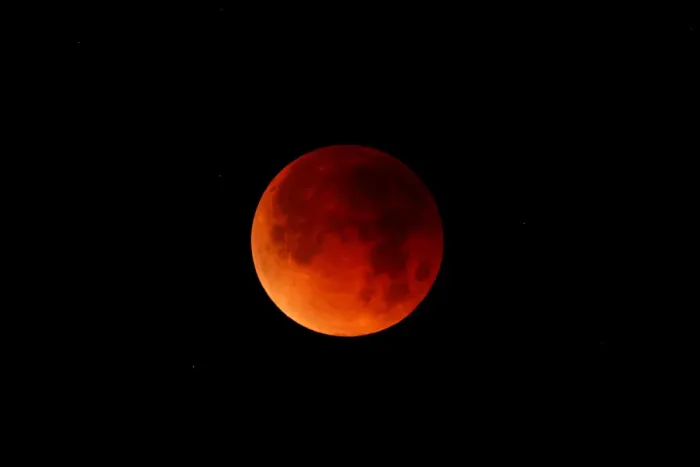 Framed Print : Stars can be seen around a lunar eclipse in Oceanside, California Framed Print : Stars can be seen around a lunar eclipse in Oceanside, California