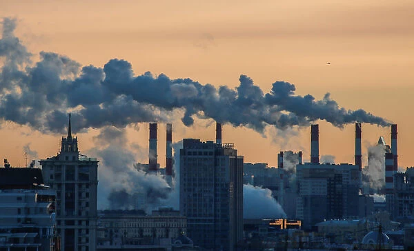 Steam rises from the chimneys of a thermal power plant in Moscow
