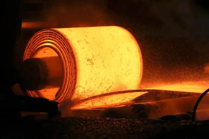 Framed Print : A steel coil is unrolled on the line at the Novolipetsk Steel PAO steel mill in Farrell