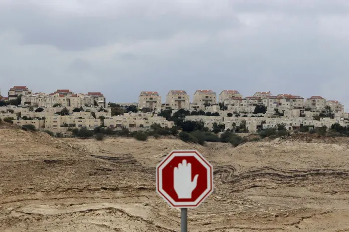 Framed Print : A stop sign is seen outside the Jewish settlement of Maale Adumim near Jerusalem