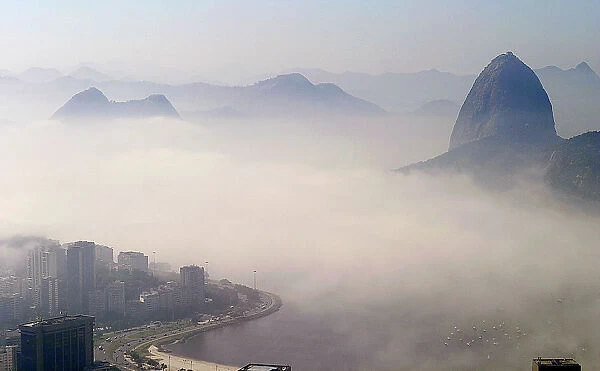 Sugar loaf mountain and Botafogo bay are seen covered by thick fog in Rio de Janeiro