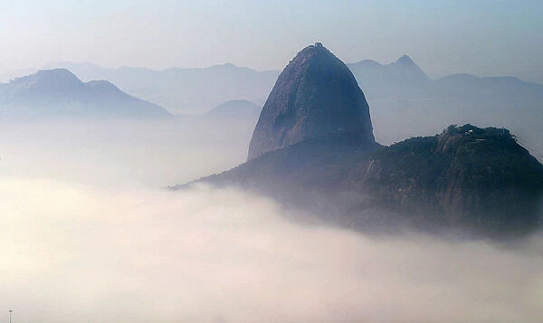 Sugar loaf mountain is seen covered by thick early morning fog in Rio de Janeiro