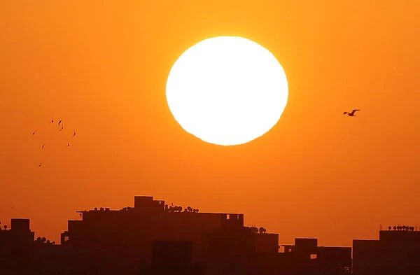 The sun rises in Cairo