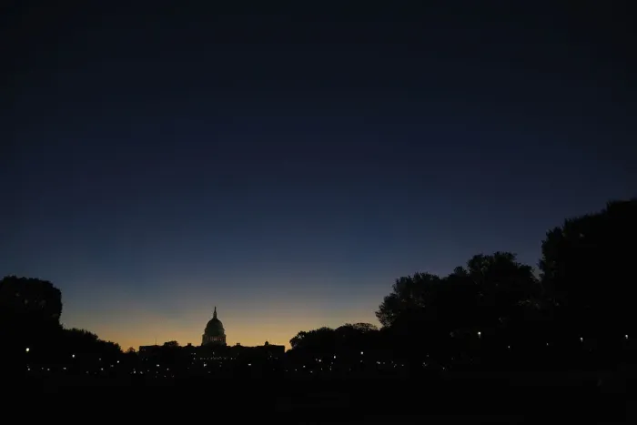 Framed Print : Sun rises over the U. S. Capitol dome in Washington Framed Print : Sun rises over the U. S. Capitol dome in Washington