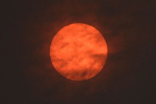 The sun is seen after dawn after the Met Office reported that storm Ophelia has drawn