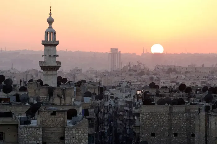 Framed Print : The sun sets over Aleppo as seen from rebel-held part of the city Framed Print : The sun sets over Aleppo as seen from rebel-held part of the city