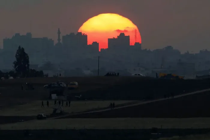 Framed Print : The sun sets over the Gaza Strip, as seen from the Israeli side of the border Framed Print : The sun sets over the Gaza Strip, as seen from the Israeli side of the border