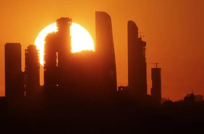 Framed Print : The sun sets behind the skyscrapers of the Moscow International Business Centre in Moscow