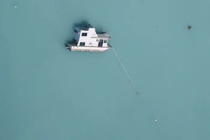 Framed Print : A sunken boat is pictured in an aerial photo in the Keys in Marathon, Florida