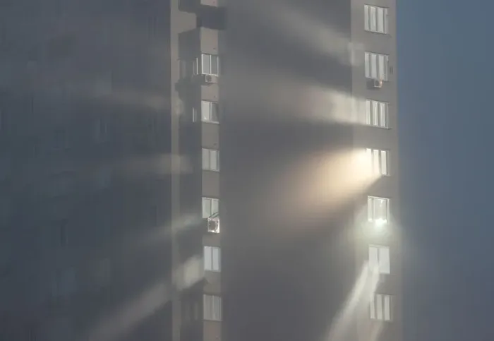 Framed Print : Sunlight reflects from windows of an apartment building on a foggy autumn day in Kiev Framed Print : Sunlight reflects from windows of an apartment building on a foggy autumn day in Kiev