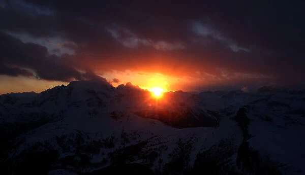 Sunset is seen over the Dolomite Mountains around Cortina D Ampezzo