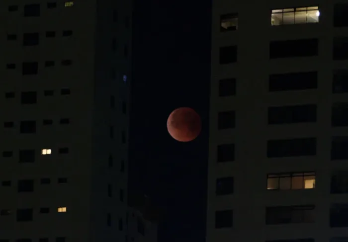 Framed Print : A Super Blue Blood Moon rises during a lunar eclipse in this picture taken from Framed Print : A Super Blue Blood Moon rises during a lunar eclipse in this picture taken from