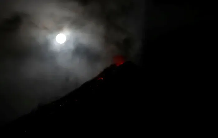 Framed Print : The super blue moon illuminates Mayon Volcano as it spews lava during a mild eruption Framed Print : The super blue moon illuminates Mayon Volcano as it spews lava during a mild eruption