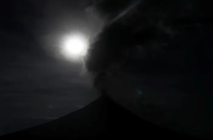 Framed Print : The super blue moon is seen above the Mayon Volcano during a total eclipse in Legazpi