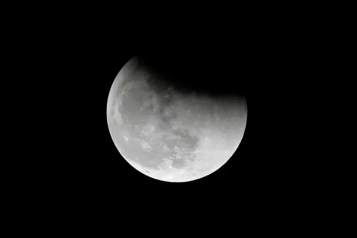 Framed Print : The super blue moon is seen during a total lunar eclipse in Beijing Framed Print : The super blue moon is seen during a total lunar eclipse in Beijing