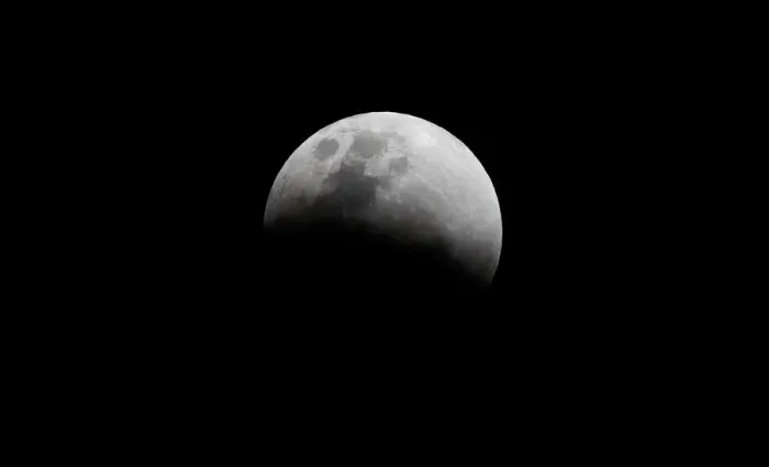 Framed Print : The super blue moon is seen during a total lunar eclipse in Legazpi Framed Print : The super blue moon is seen during a total lunar eclipse in Legazpi