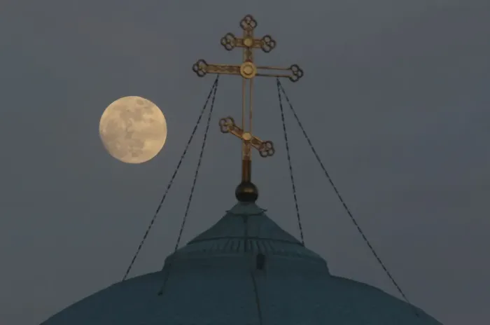 Framed Print : A supermoon rises behind the cross of the Saint Nicholas cathedral in Yevpatoriya