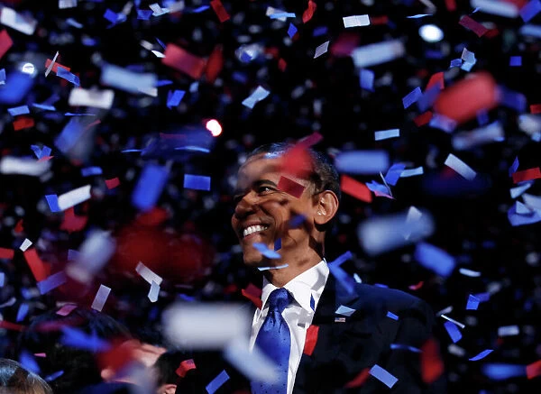 TB3E8B70L3KVB. U.S. President Barack Obama celebrates on stage as confetti
