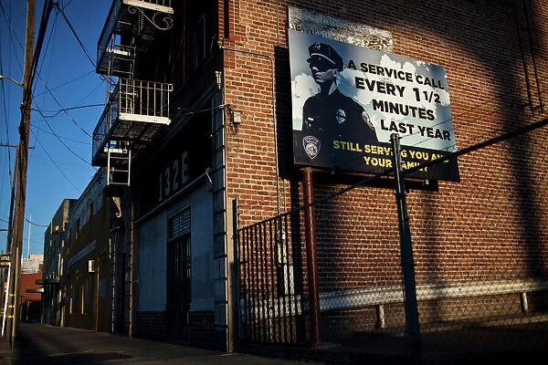 TM3E83J0U1S01. A sign promoting the Stockton Police in downtown Stockton