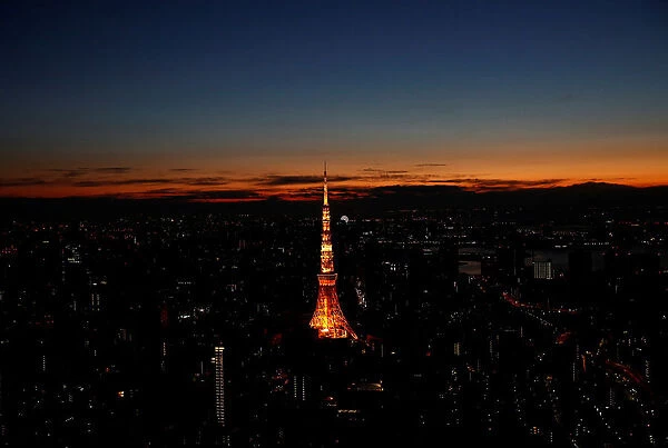 Tokyo tower is seen before the first sunrise on New Years Day from Roppongi Hills