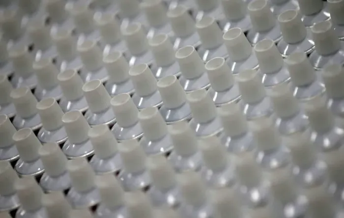 Framed Print : Toothpaste tubes are seen on the production line at the Unilever factory in Lagos