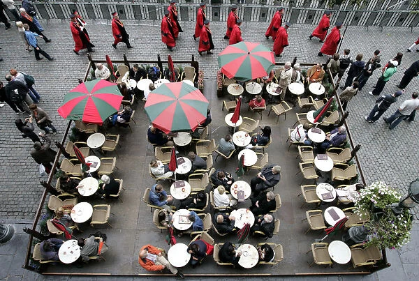 Tourists sit on a terrace during the annual Belgian beer weekend at the Grand?Place