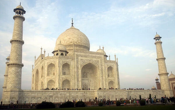 Tourists visit the historic Taj Mahal in Agra