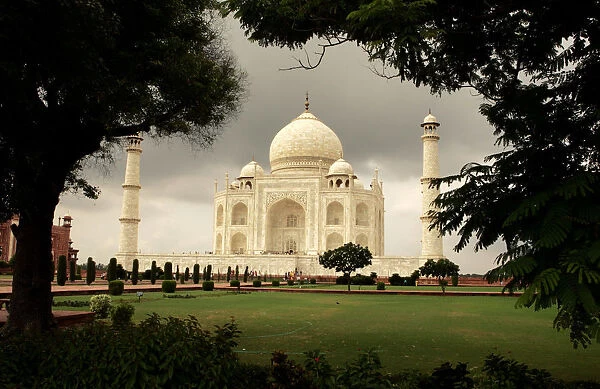 Tourists visit the Taj Mahal in the tourist city of Agra