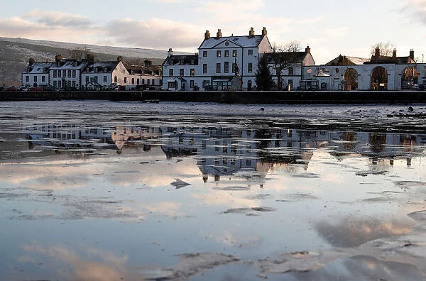 The town of Inveraray is reflected in Loch Fyne, Scotland