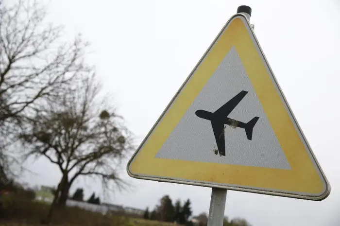 Framed Print : A traffic sign warning of low flying aircraft stands near to LSC Westerwald flight club Framed Print : A traffic sign warning of low flying aircraft stands near to LSC Westerwald flight club