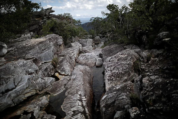 A trail is seen near the Abyss Waterfall at Chapada dos Veadeiros National Park in Alto