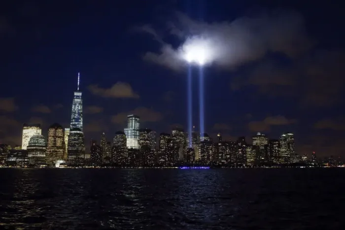 Framed Print : Tribute in Light is illuminated on the skyline of lower Manhattan during events marking
