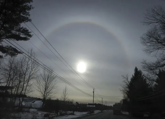 Framed Print : Truck drives down a highway as a sun dog appears in the sky as seen from Fort Ann in