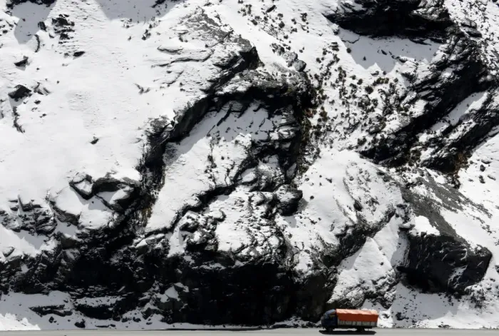 Framed Print : A truck is seen near La Cumbre after a heavy snow storm near La Paz Framed Print : A truck is seen near La Cumbre after a heavy snow storm near La Paz