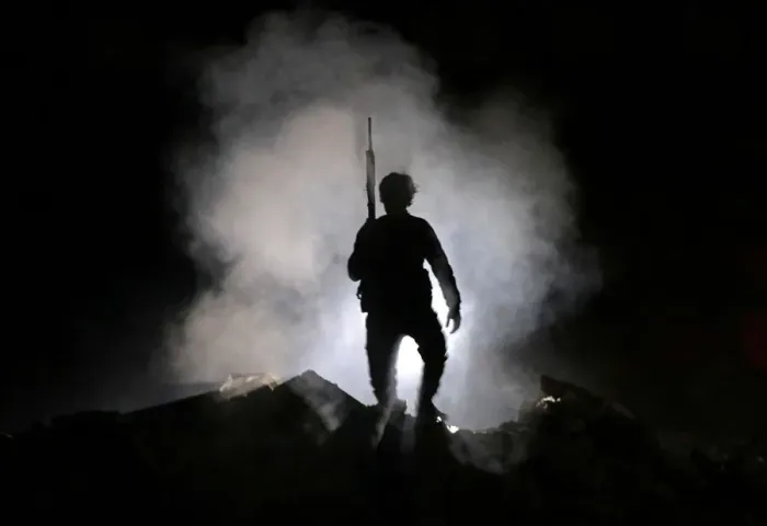 Framed Print : Turkey-backed Free Syrian Army fighter holds a weapon in the town of Tadef in Aleppo