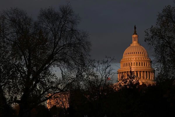The U. S. Capitol building is pictured at sunset on Capitol Hill in Washington