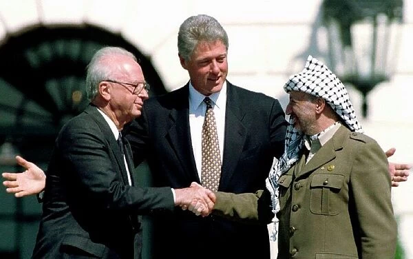 U. S. President Clinton with Israeli Prime Minister Rabin and PLO President