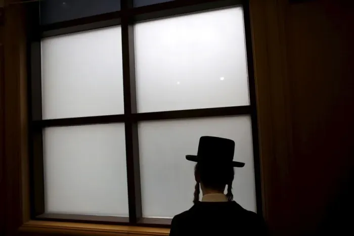 Framed Print : An ultra-Orthodox Jewish man attends the funeral of Rabbi Yochanan Sofer Framed Print : An ultra-Orthodox Jewish man attends the funeral of Rabbi Yochanan Sofer