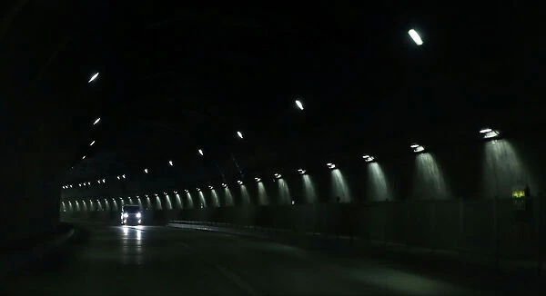 A vehicle travels in an expressway tunnel in Miyako