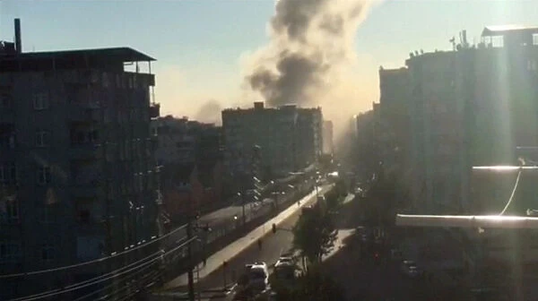 Video still shows smoke rising from an explosion in a Diyarbakir