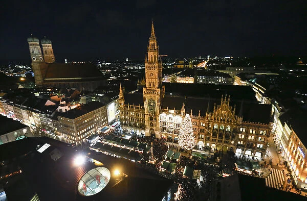 A view of Munichs illuminated townhall during the Christmas market after the official